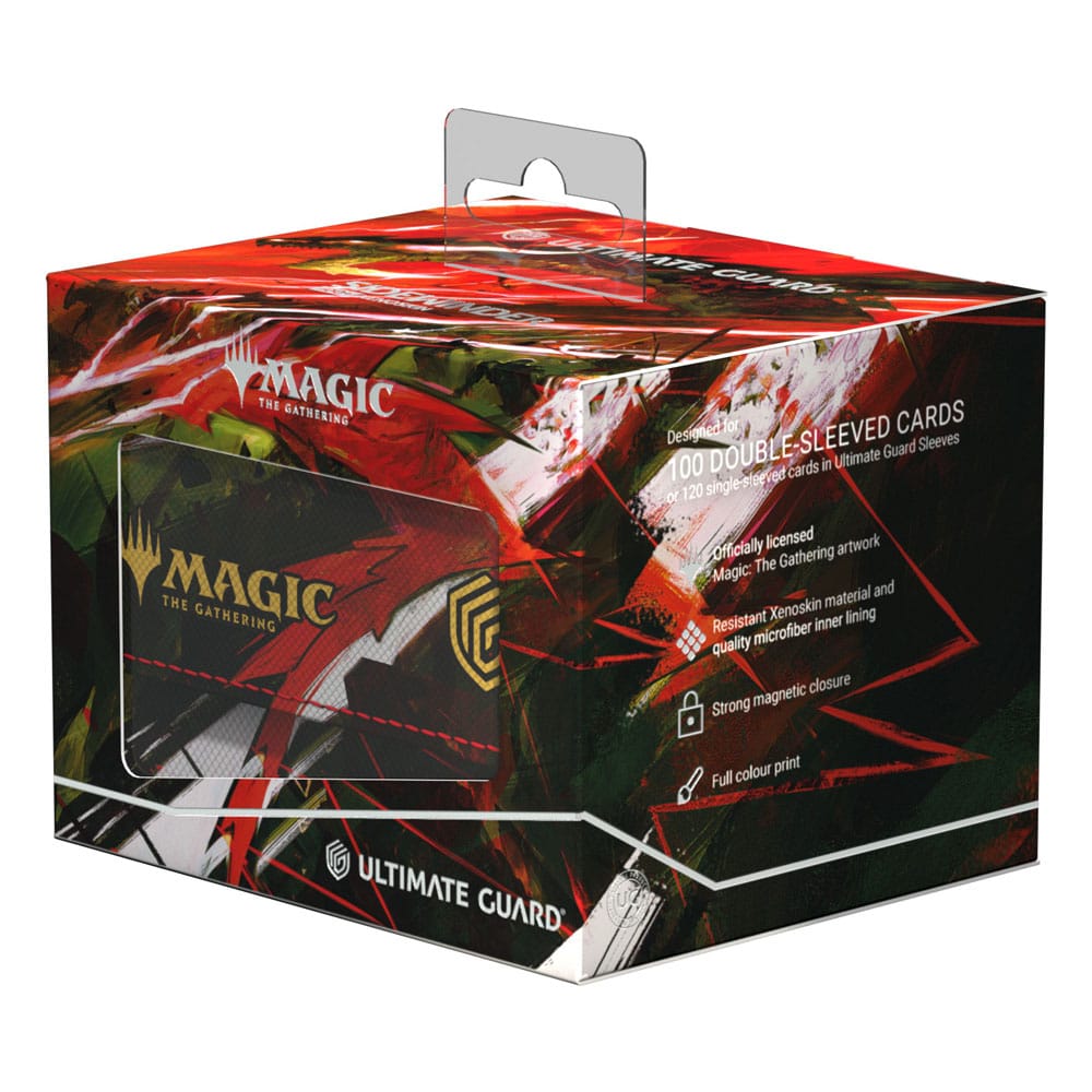 Boîte de deck Ultimate Guard Sidewinder 100+ Xenoskin posée à côté d'autres accessoires MTG