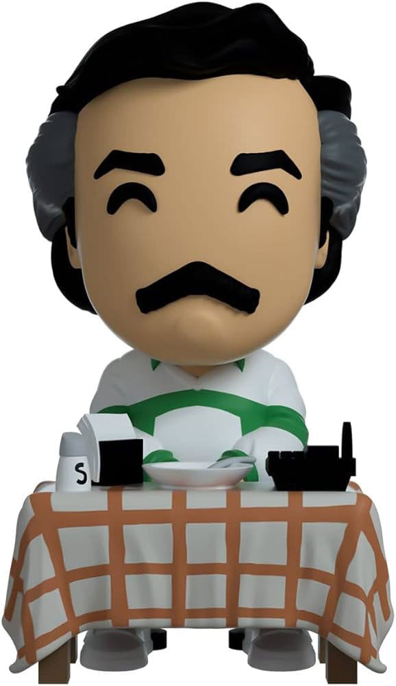 Figurine Youtooz Narcos Bored El Patron 4 pouces, représentant Pablo Escobar assis, ennuyé, dans sa planque avec table et chaise rouge. Détail du mème viral Netflix.