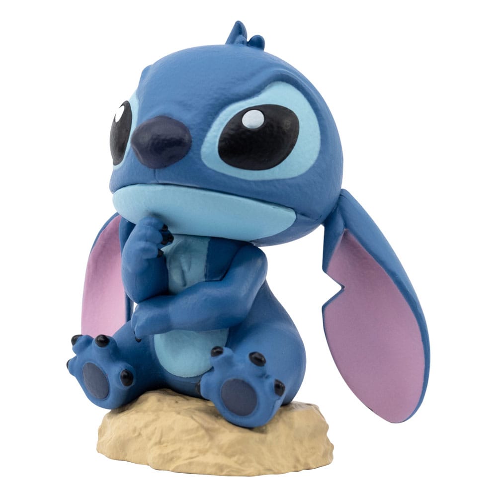 Présentoir de figurines Lilo & Stitch avec des éléments décoratifs