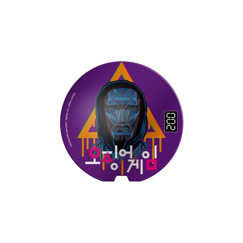 Gros plan sur le logo Squid Game sur une tirelire capsule